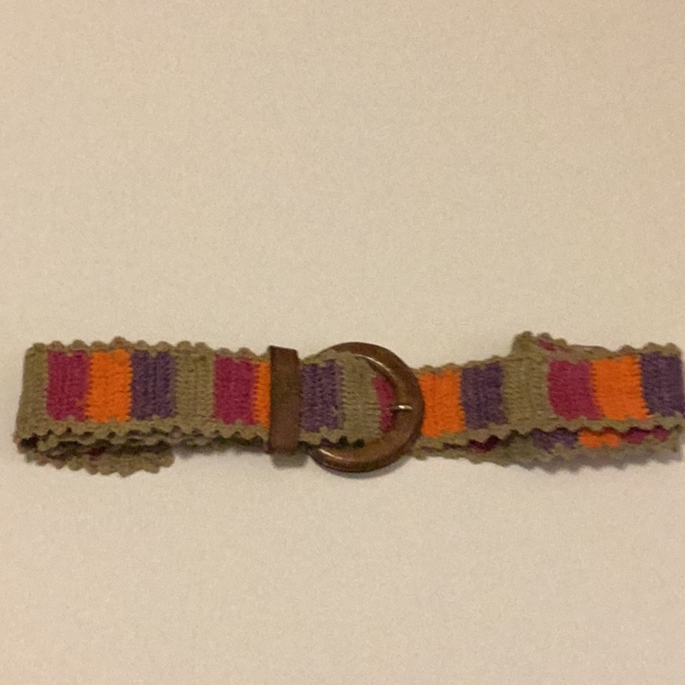 Belt multi colored woven cloth with leather buckle. 45.5” width is 1&3/4"